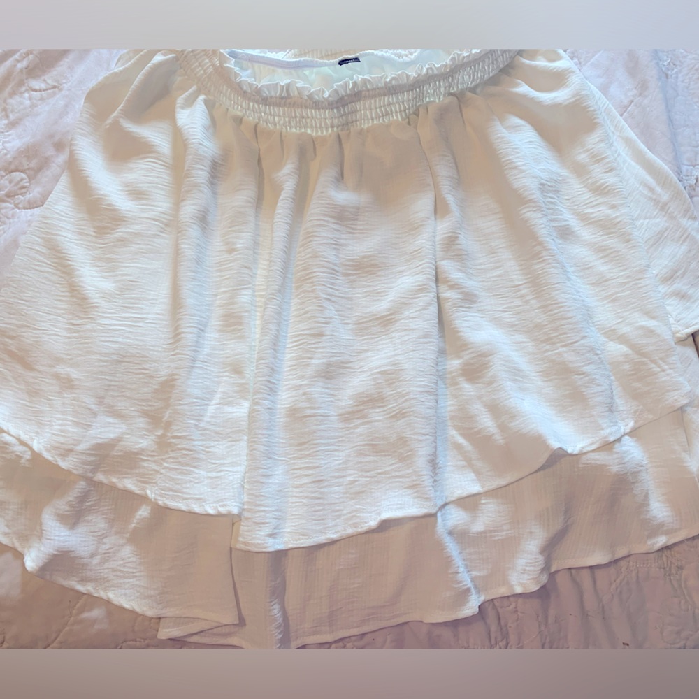 Super cute white ruffle skirt!